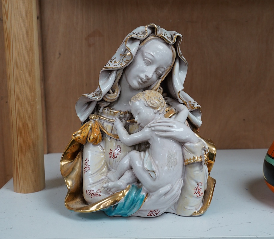 Eugenio Pattarino (Italian, 1885-1971), a tin glazed terracotta bust of Madonna and child, 20cm. Condition - fair, repair to her clothing to the right of child